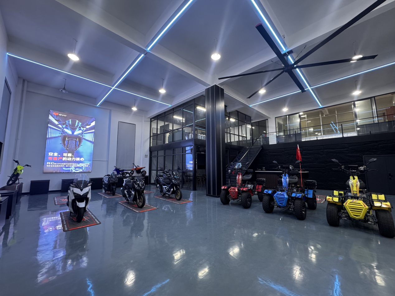 A showroom displaying motorcycles and electric vehicles
